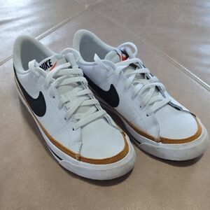 Nike Girl's White and Black Sneakers with Tan Accents